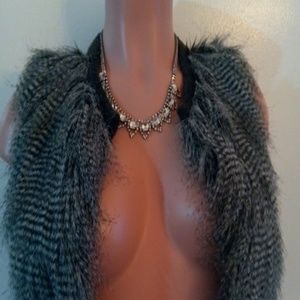 Grey and black fringe vest.